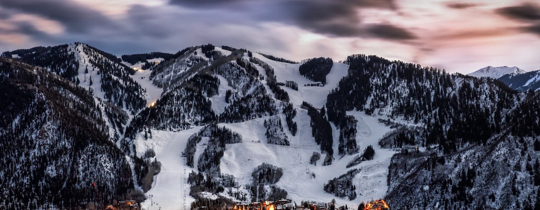 Snow-capped mountain peaks at golden hour